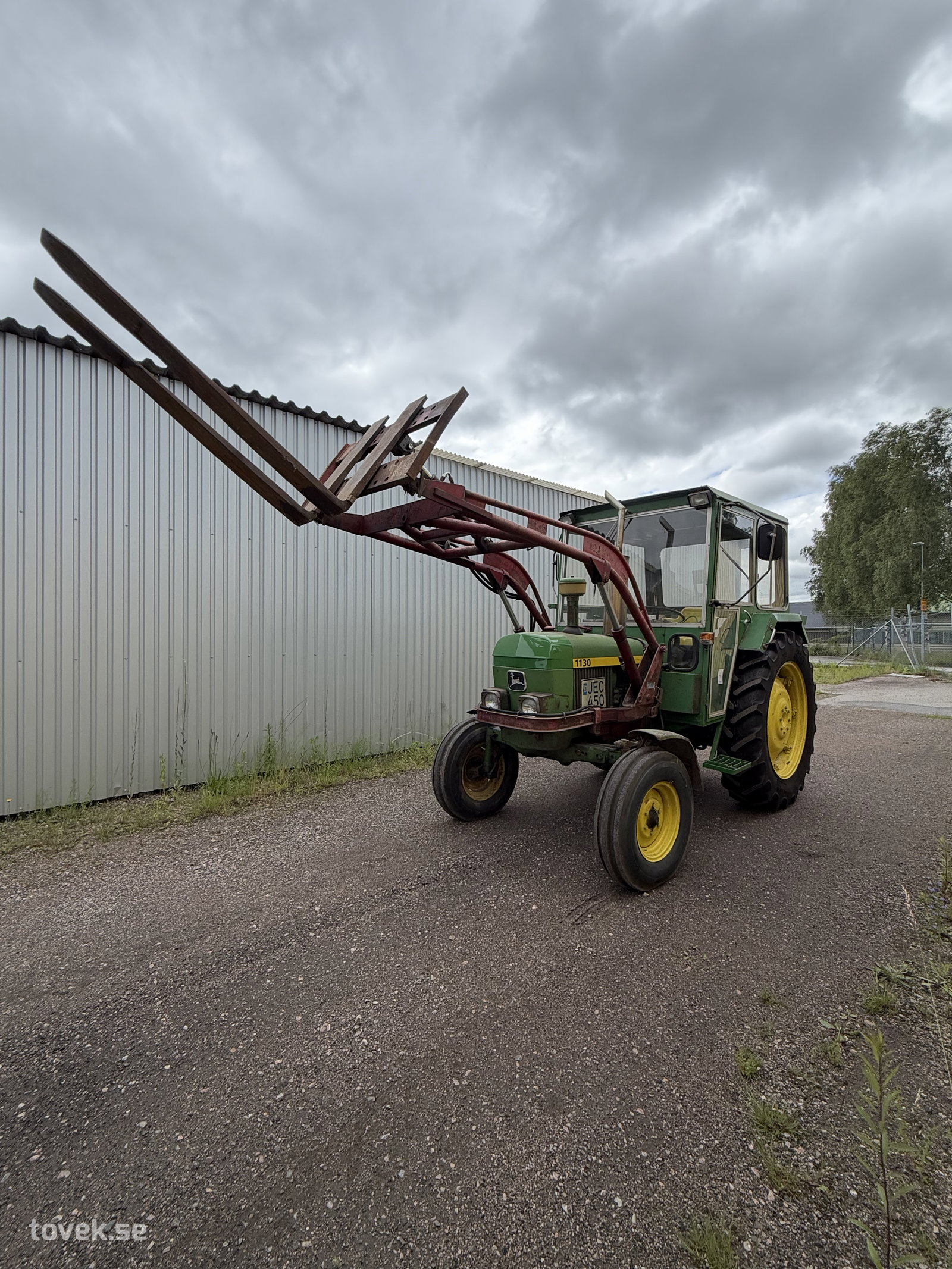 Traktor John Deere 1130 med frontlastare, 1976